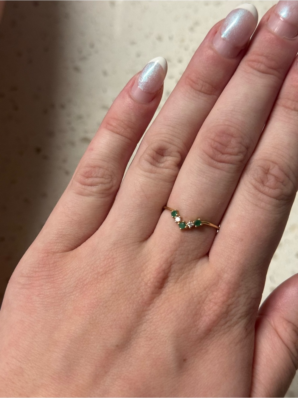 Gold V-Shaped Ring with Emerald Green Stones
